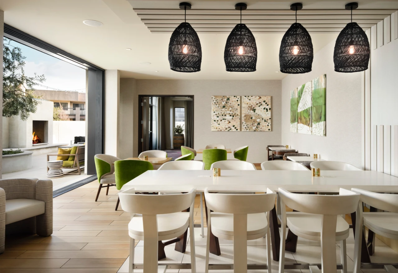 Dining area at Rootstock Kitchen with outdoor patio access.